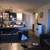 Cluttered garage before junk removal